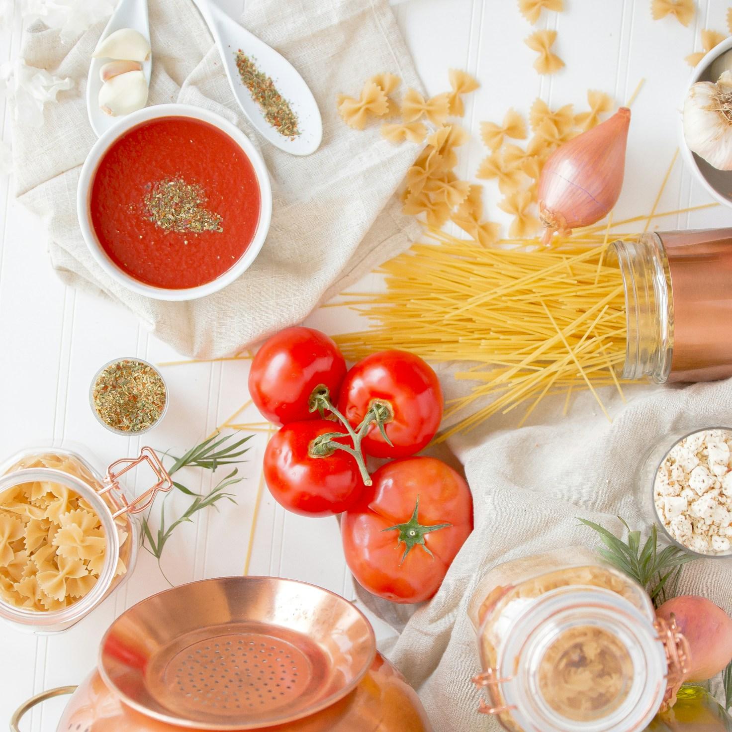 Diverse group of community members sharing a meal together, showcasing the social bonds formed through collaborative cooking